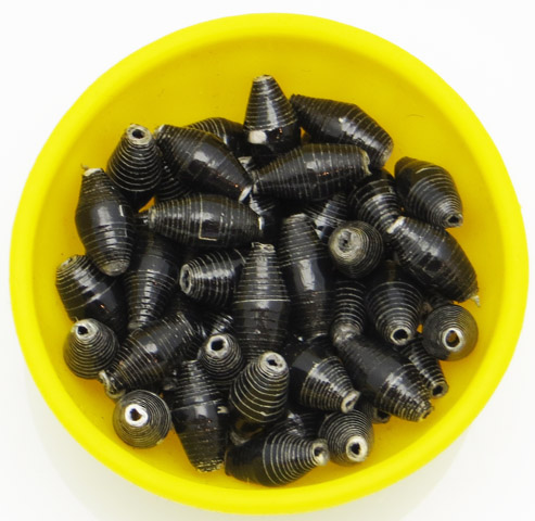 Photo of 50 black bi-cone beads that are available to purchase.