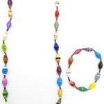 Women's matching beaded necklace and bracelet set in multicolor. Handcrafted with paper beads by Ugandan women artisans.