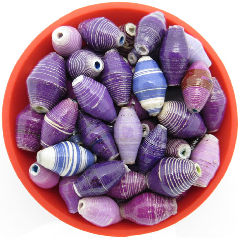 Photo of shades of purple bi-cone beads that are available to purchase.