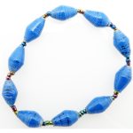 True blue bead bracelet closeup, The stretch bracelet contains 10 paper beads separated by seed beads.