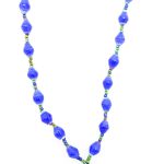 Royal blue lanyard made of paper beads with a small seed bead loop at the bottom and a metal clip to attach your badge. The lanyard is shown on a plain white background. The top of the lanyard is not visible.