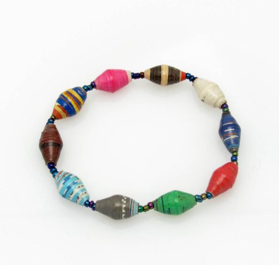 Multi-color bead bracelet closeup, The stretch bracelet contains 10 paper beads separated by seed beads.