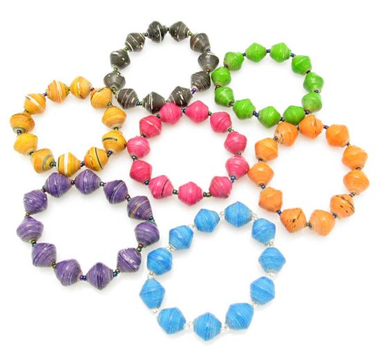 Grouping of 7 round bead stretch bracelets in black, lime green, orange, sky blue, purple, reddish pink, and golden yellow.