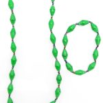 Women's matching beaded necklace and bracelet set in lime green color. Handcrafted with paper beads by Ugandan women artisans.