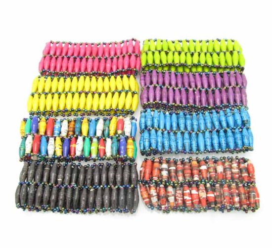 Grouping of eight two-row beaded stretch bracelets for women in a variety of solid and patterned colors.