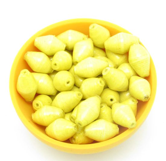 Photo of 50 bright yellow matched bi-cone beads that are available to purchase.