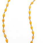 Tangerine orange paper bead necklace on a plain white background. The top of the necklace is not visible.