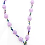 Lavender lanyard made of paper beads with a small seed bead loop at the bottom and a metal clip to attach your badge. The lanyard is shown on a plain white background. The top of the lanyard is not visible.