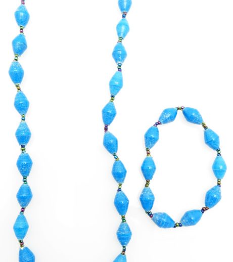 Women's matching beaded necklace and bracelet set in sky blue color. Handcrafted with paper beads by Ugandan women artisans.