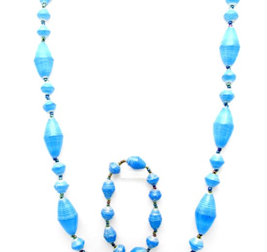 Women's matching beaded necklace and bracelet set in sky blue small & large oval bead pattern. Handcrafted with paper beads by Ugandan women artisans.