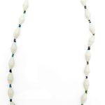 Pure white paper bead necklace on a plain white background. The top of the necklace is not visible.