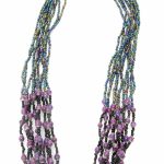 Photo of paper and seed bead necklace in purple that is available for purchase. The bottom half contains many small purple paper beads. The top 60% of the necklace contains multi-strands of shiny blue/green/purple seed beads.