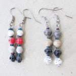 Photo of 2 pairs of neutral colors 4-bead earrings that are available to purchase. Choose your pair: white/red/gray/black or medium gray/tan/black/white