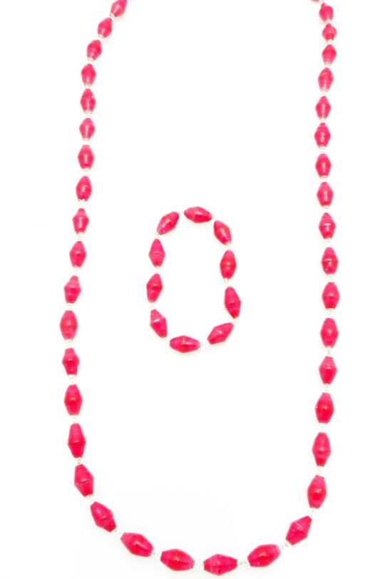 Women's matching beaded necklace and bracelet set in hot pink color. Handcrafted with paper beads by Ugandan women artisans.