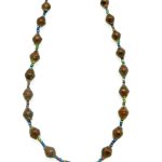 Brown lanyard made of paper beads with a small seed bead loop at the bottom and a metal clip to attach your badge. The lanyard is shown on a plain white background. The top of the lanyard is not visible.