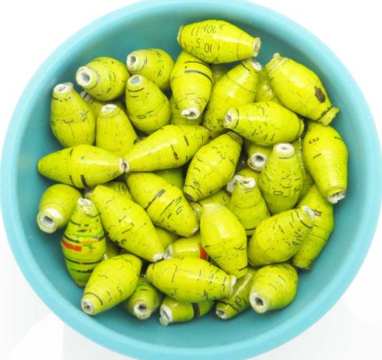 Photo of 50 spring green bi-cone beads that are available to purchase.