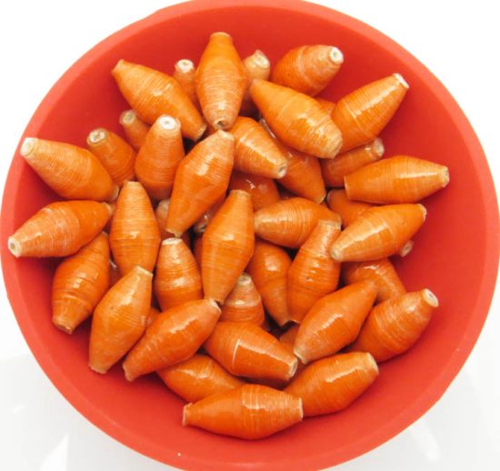 Photo of 50 orange bi-cone beads that are available to purchase.