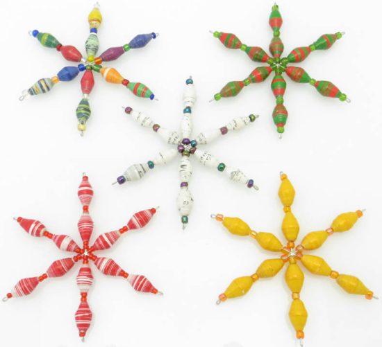 Photo of beaded star shaped tree ornaments that are available to purchase in units of 1 each. 5 are shown demonstrating some of the color choices available: multi-color, white with flecks, red and green striped, red & white striped, and yellow.