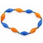 Blue & orange alternating colors bead bracelet closeup, The stretch bracelet contains 10 paper beads separated by seed beads.