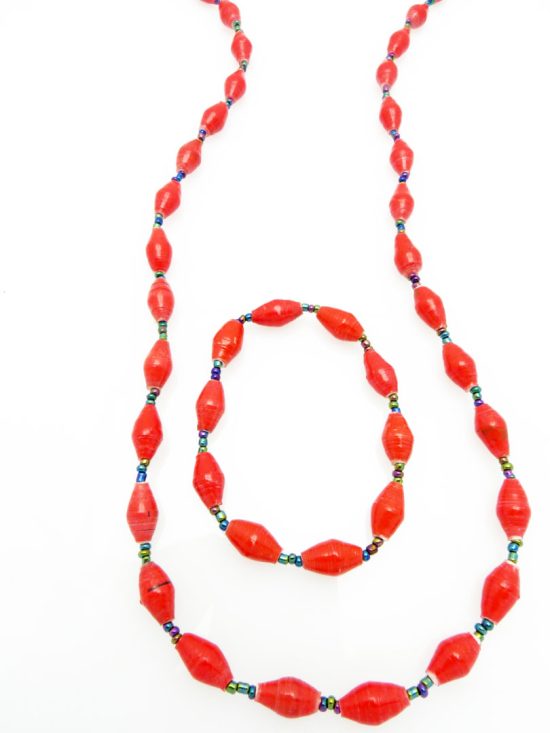 Women's matching beaded necklace and bracelet set in bright red. Handcrafted with paper beads by Ugandan women artisans.