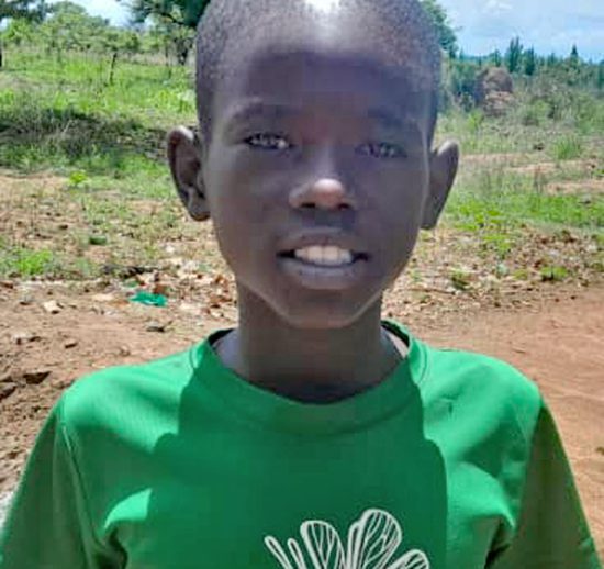 Gabriel, Ugandan child, in green tshirt needs a sponsor for school