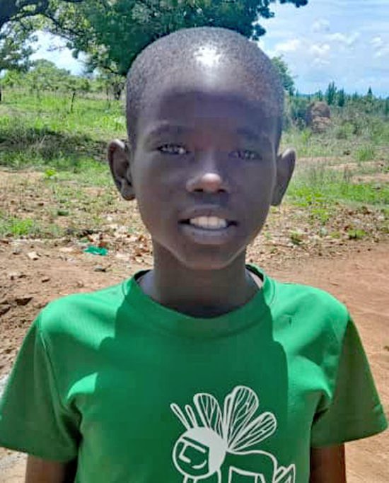 Gabriel, Ugandan child, in green tshirt needs a sponsor for school