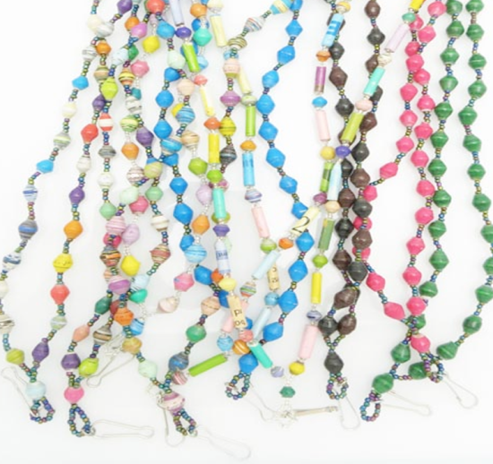 Group of 12 lanyards in a variety of colors made of paper beads with a small seed bead loop at the bottom and a metal clip to attach your badge. The lanyard is shown on a plain white background. The top of the lanyard is not visible.