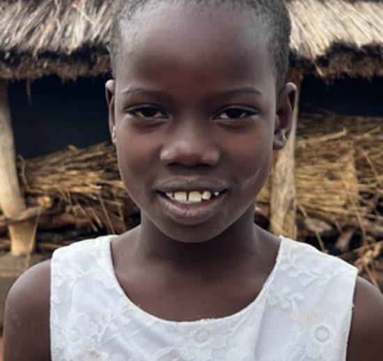 Photo of Ugandan 1st grader student, Laker Nifty who needs a sponsor for her schooling.