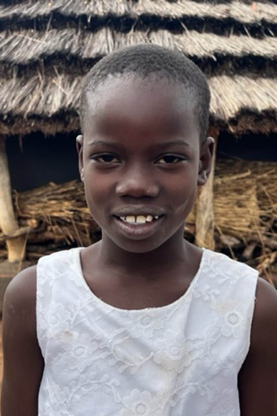 Photo of Ugandan 1st grader student, Laker Nifty who needs a sponsor for her schooling.