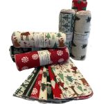 roll of 12 flannel unpaper towels in a variety of holiday colors