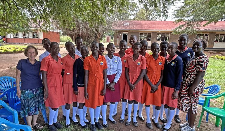 Carol with Secondary Girl Students in northern Uganda aug 2025